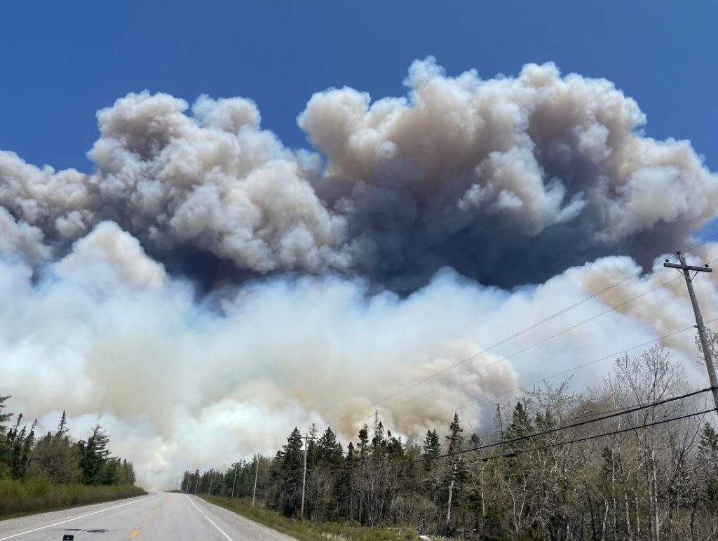 Highway 103 expected to reopen as wildfire continues to burn in