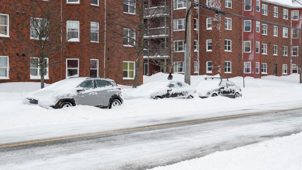 Three cars plowed in after street plow cleared snow