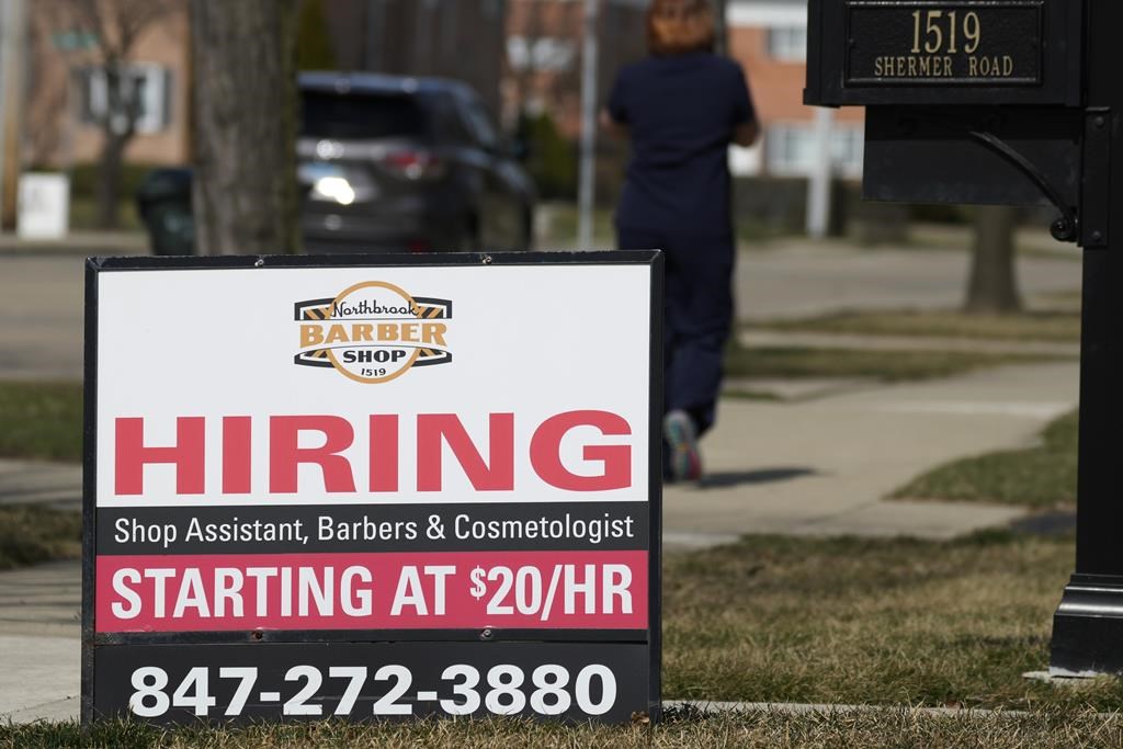 Applications for U.S. unemployment benefits dip to 210,000 in strong job market is strong
