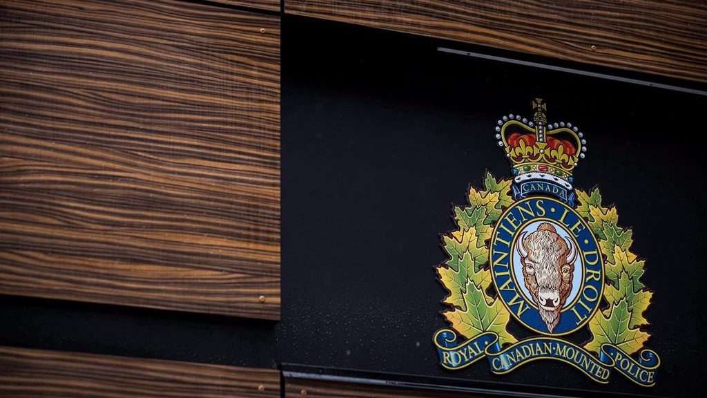 The RCMP logo is