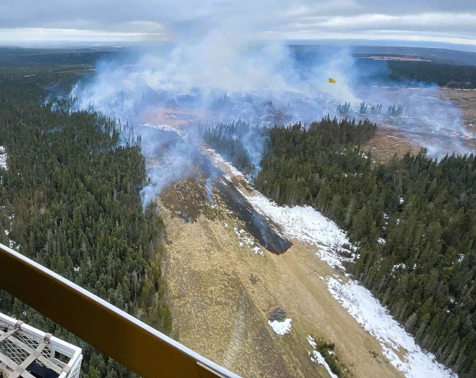 Wildfire sparked by pipeline rupture under control; investigation continues