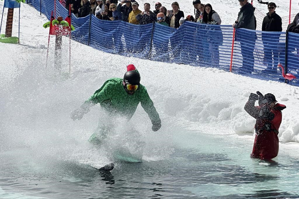 Soar, slide, splash? It’s skiers’ choice as spring’s wacky pond skimming tradition returns