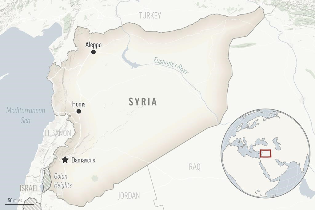 A suspected Islamic State group attack on pro-government force in east Syria kills at least 13