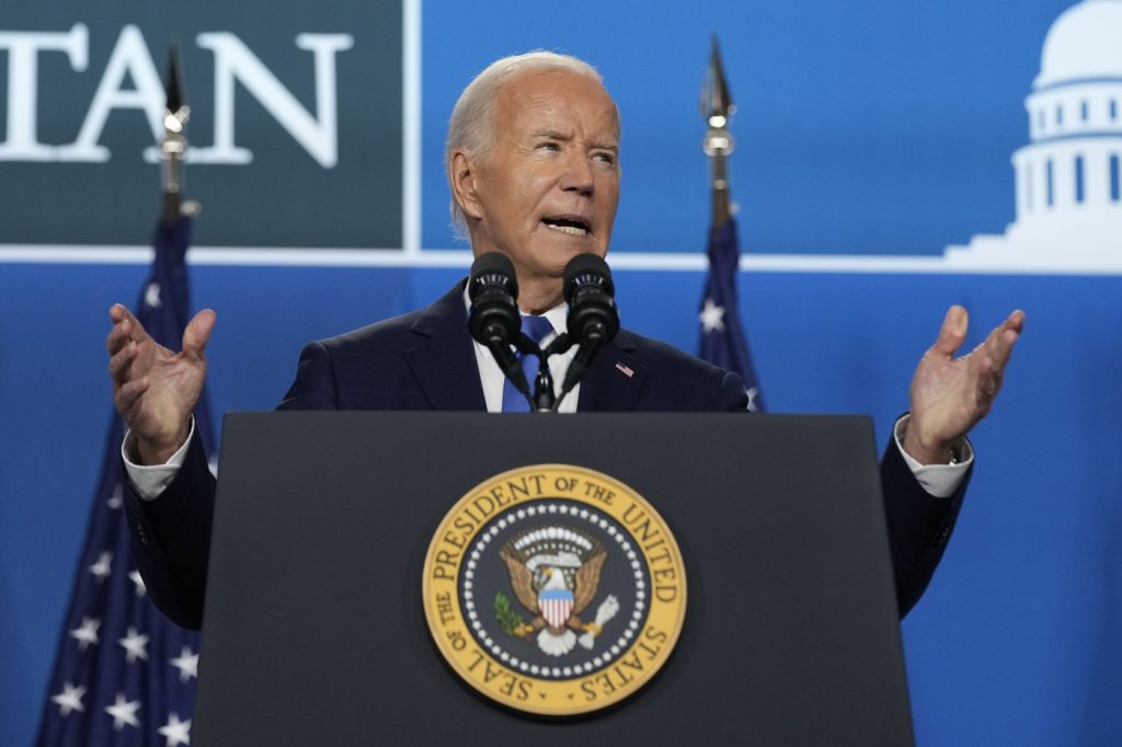 Biden says during news conference he's going to the job