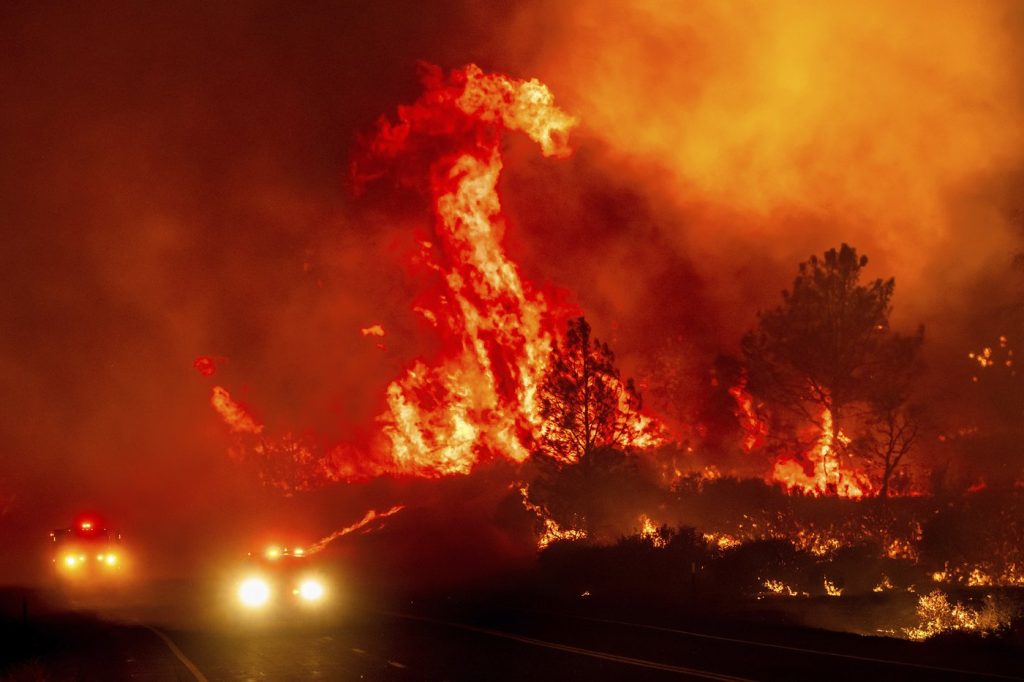 California's largest wildfire explodes in size as fires rage across US West