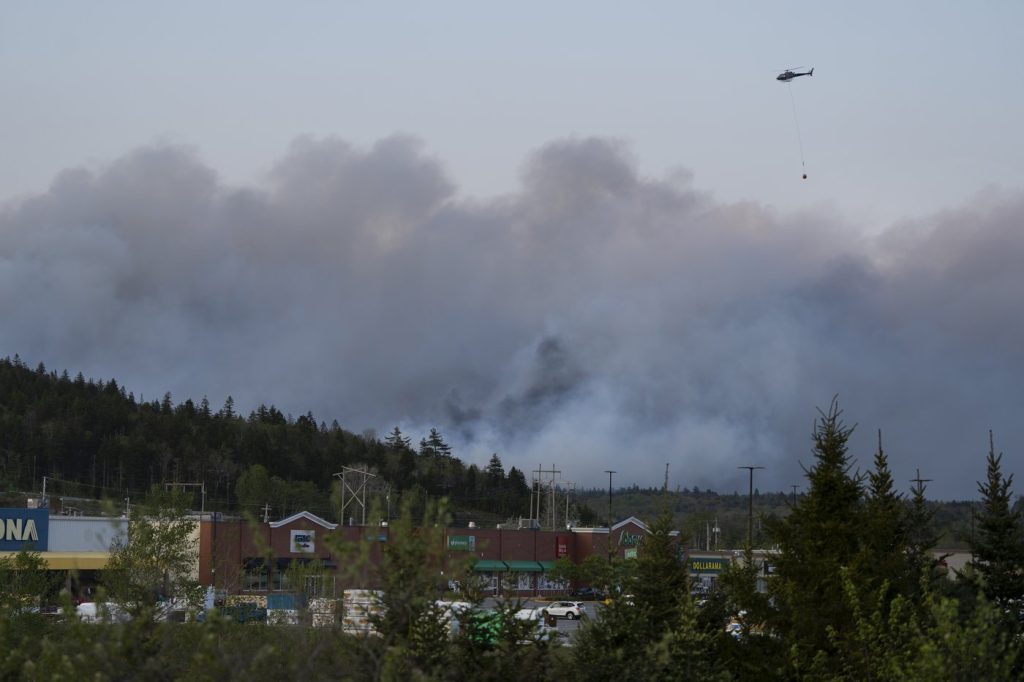 Insurance claim tally for last year's floods, wildfires in Nova Scotia: $490 million
