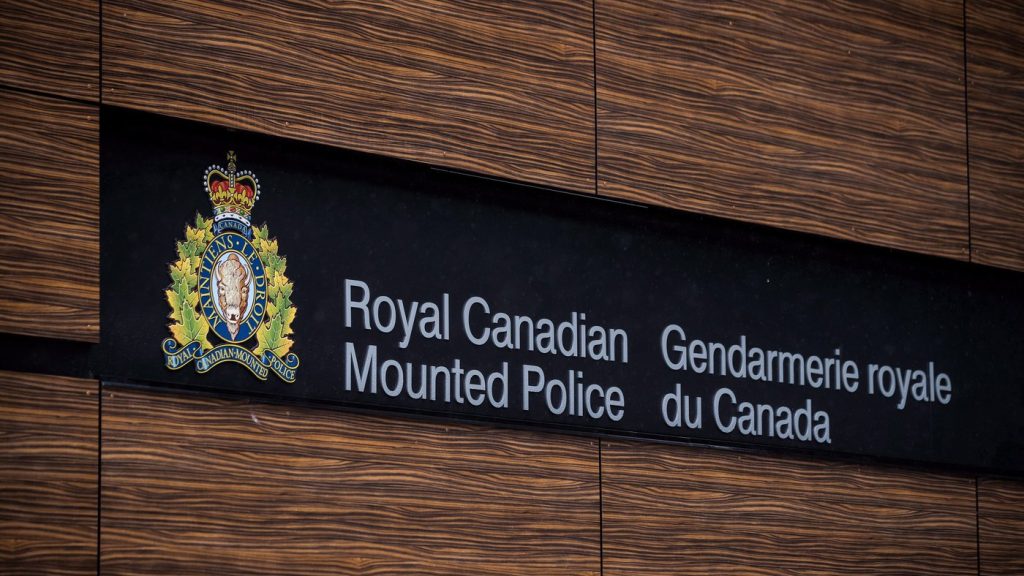 The RCMP logo is