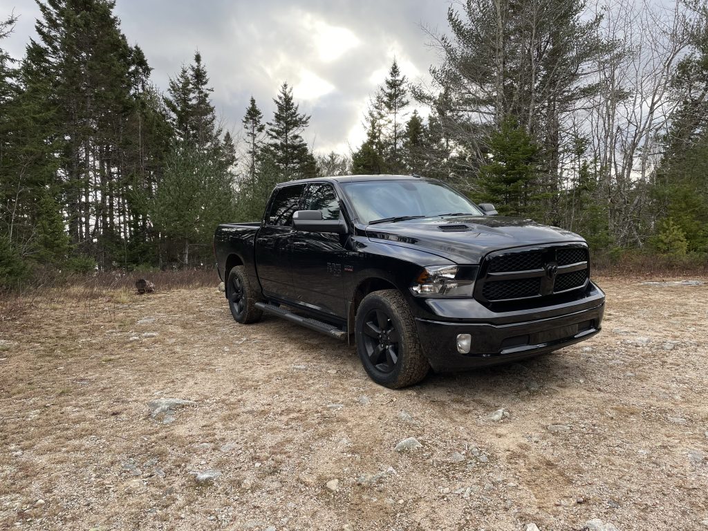 black ram 1500 truck on gravel road