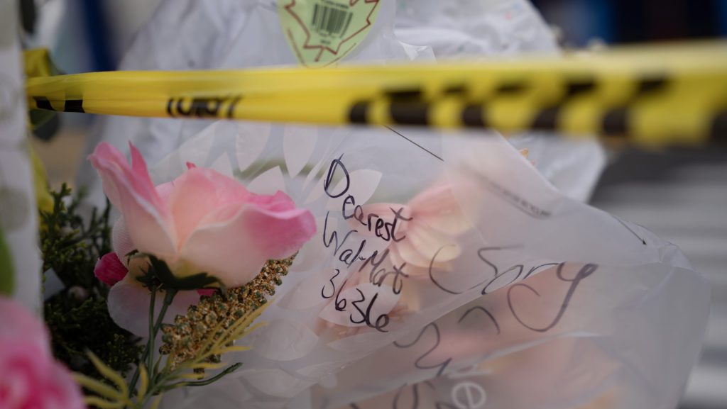 Small memorial set up outside Walmart where 19-year-old found dead in bakery oven