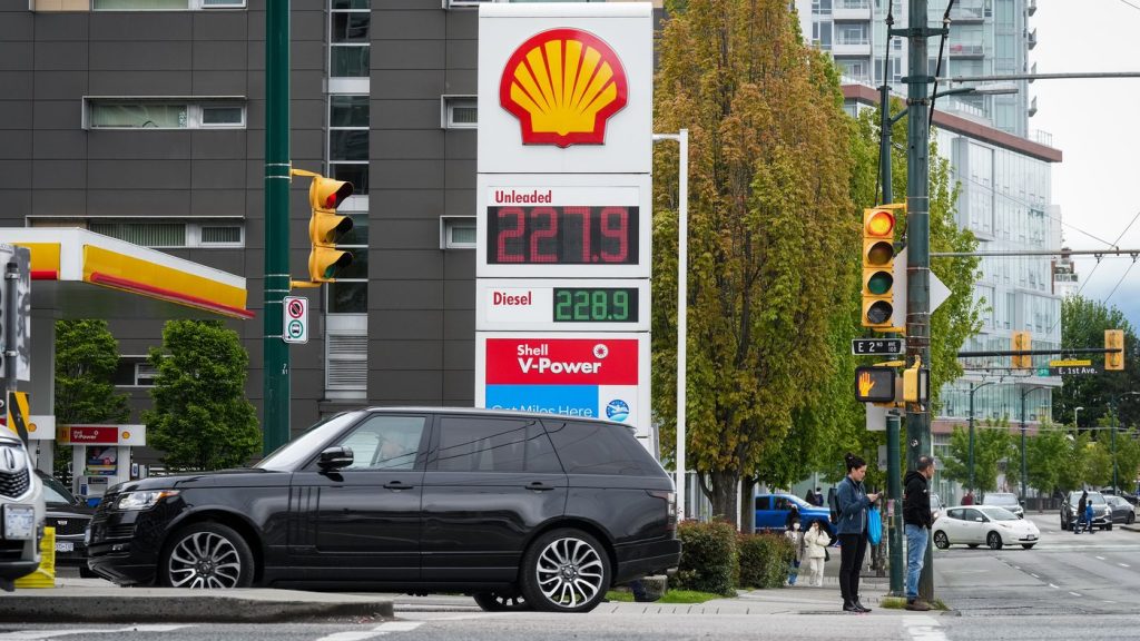 Carbon pricing rebates land in bank accounts as Liberals defend embattled policy