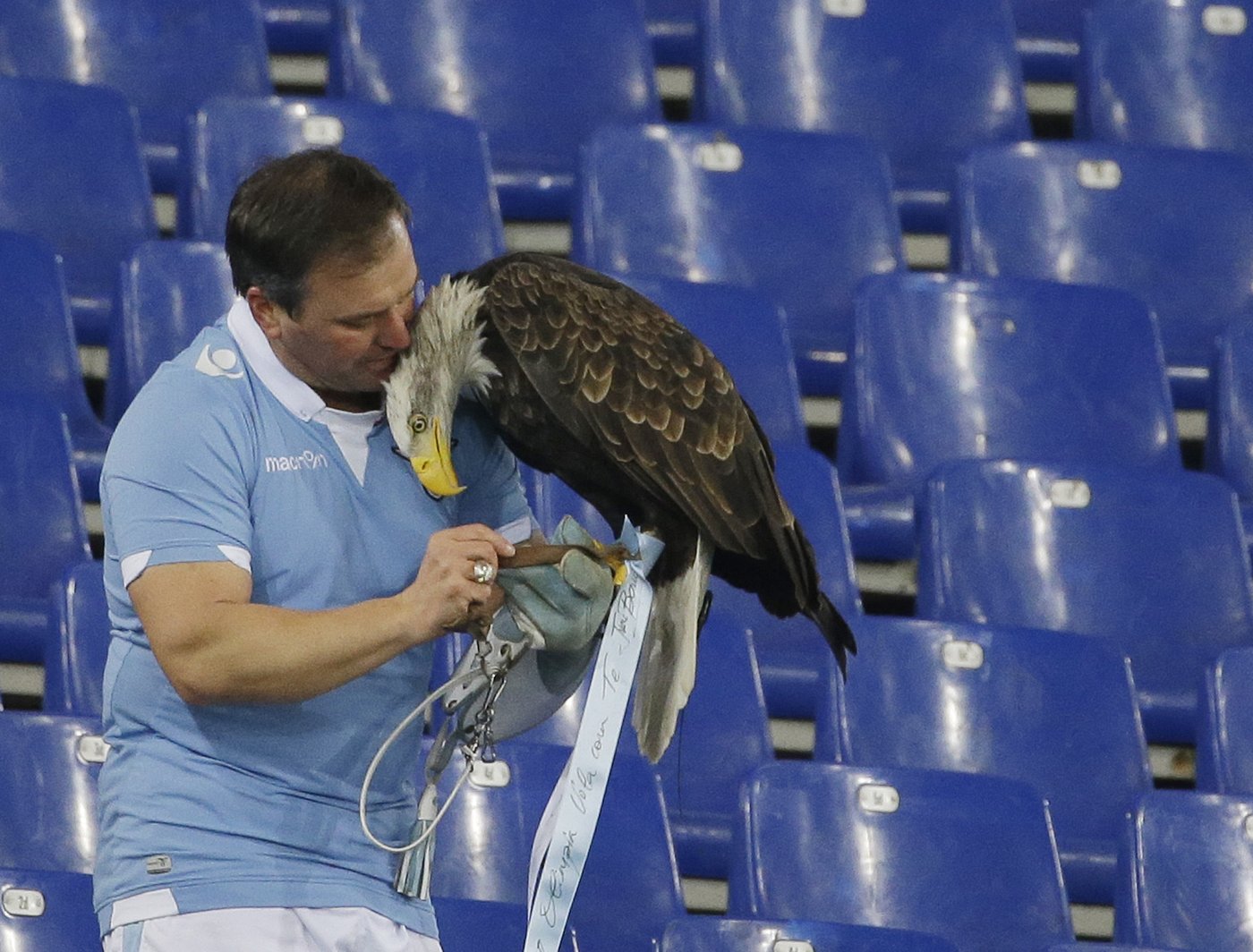 Italian soccer club Lazio fires falconer for posting photos of his