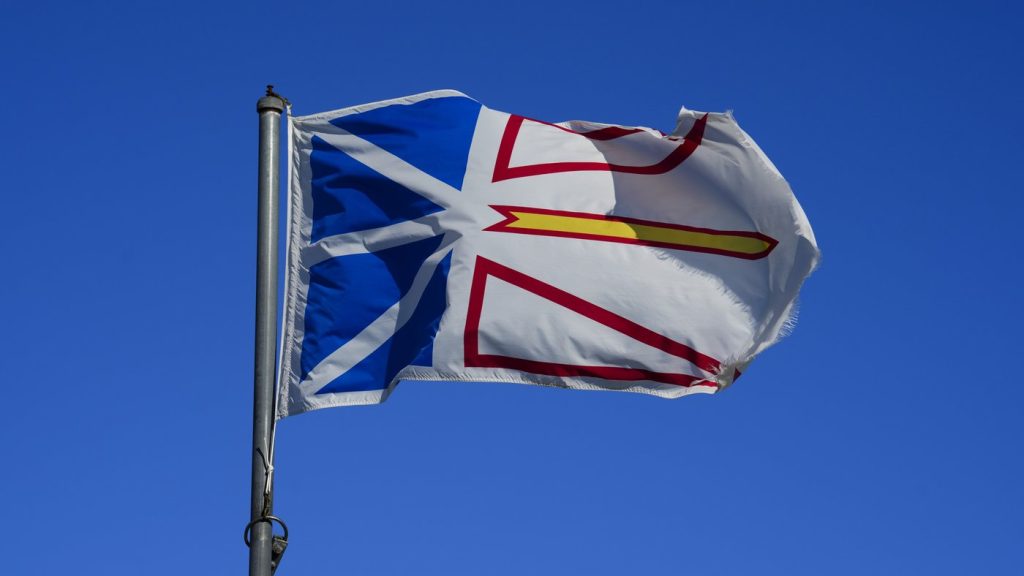 A Newfoundland flag flies in the wind in Rocky Harbour, Nfld., on Sept. 4, 2024. THE CANADIAN PRESS/Sean Kilpatrick