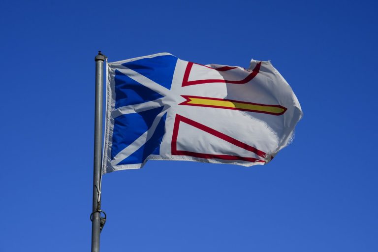 A Newfoundland flag flies in the wind in Rocky Harbour, Nfld., on Sept. 4, 2024. THE CANADIAN PRESS/Sean Kilpatrick
