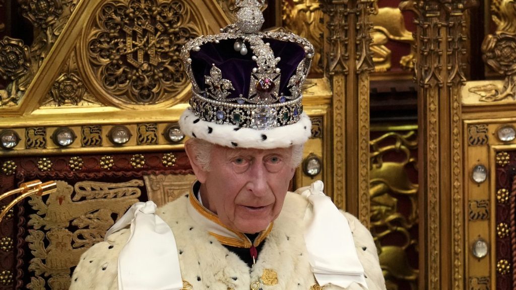 FILE - King Charles III wearing the Crown Jewels attends the State Opening of Parliament in the House of Lords, London, Wednesday, July 17, 2024. (AP Photo/Kirsty Wigglesworth, Pool File)