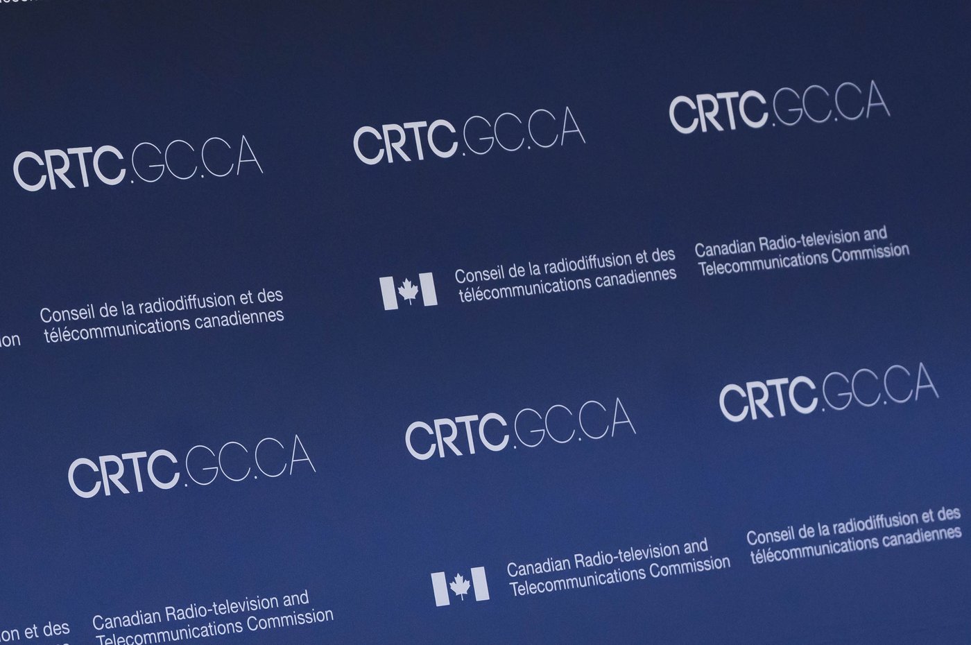 A Canadian telecom story image as the CRTC pressures Bell and Telus over new fees