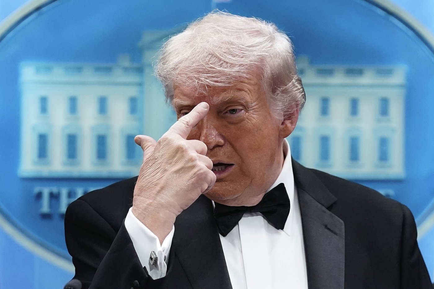 Trump safe after he is evacuated following shooting at Washington journalists’ dinner, in photos