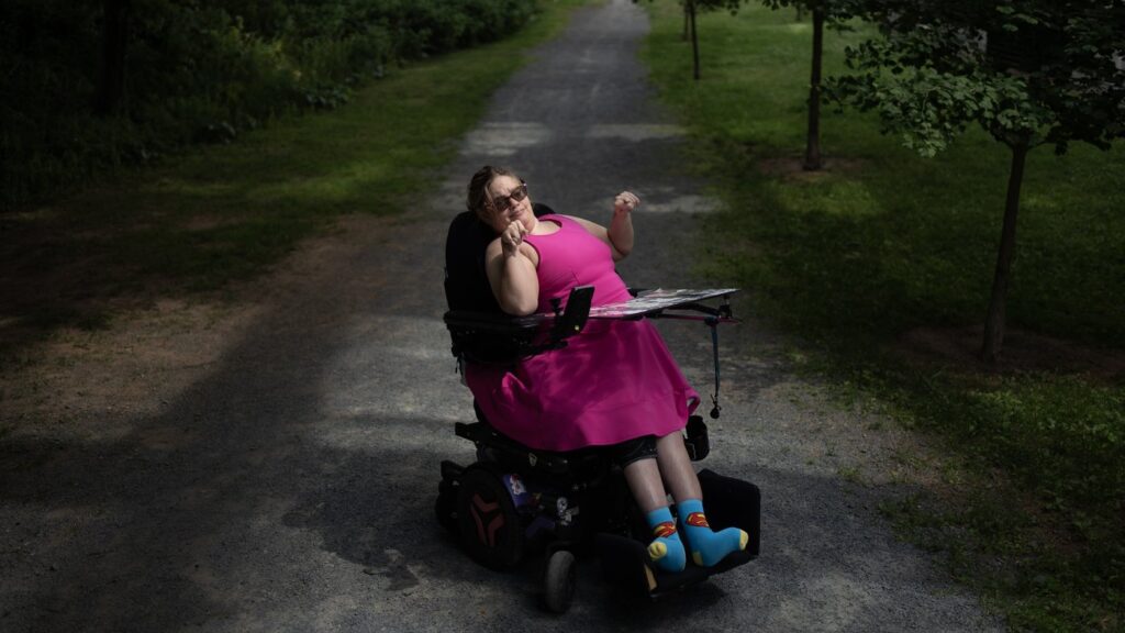 Victoria Levack, who lives with cerebral palsy, poses in Halifax on Thursday, July 31, 2025. THE CANADIAN PRESS/Darren Calabrese