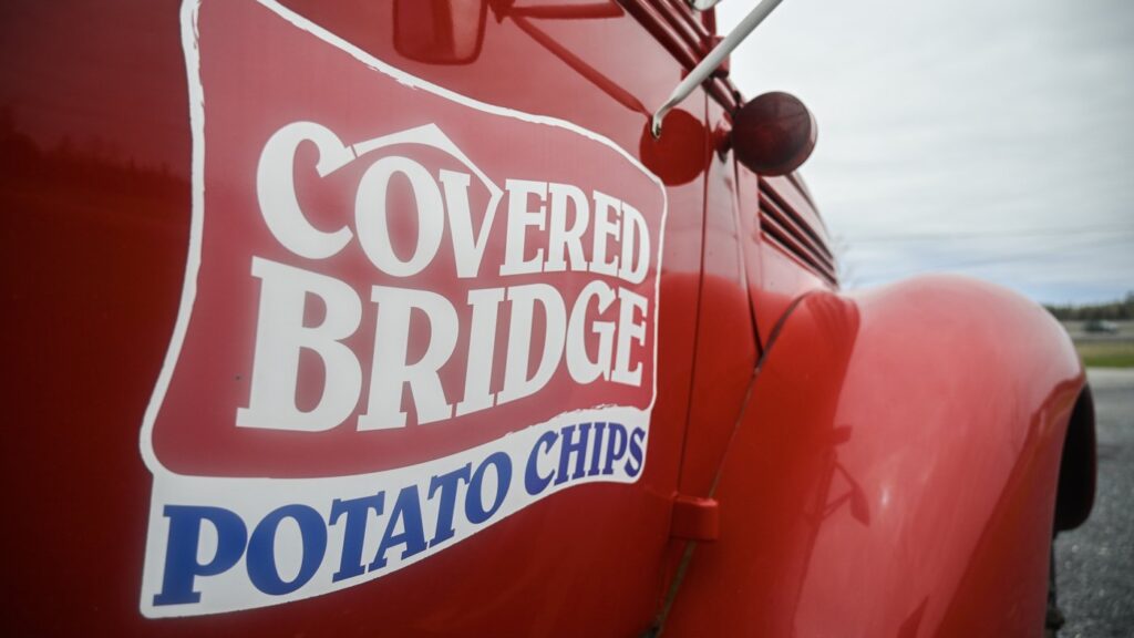 A Covered Bridge Potato Chips truck is seen next to the factory site in Hartland, N.B., on Friday, May 9, 2025. THE CANADIAN PRESS/Graham Hughes