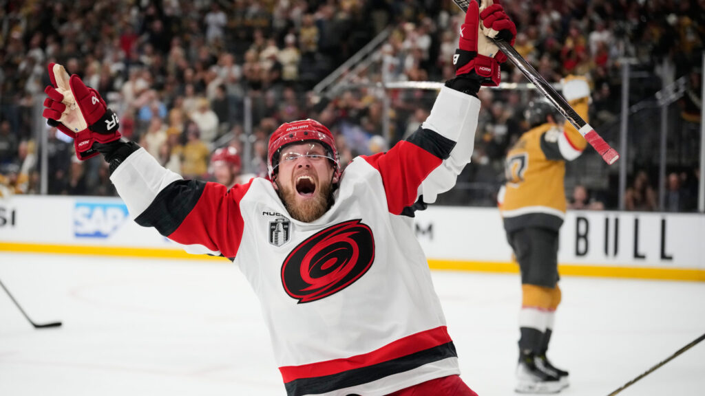 Carolina Hurricanes left wing Nikolaj Ehlers (27) celebrates after scoring an empty-net goal during the third period in Game 6 of the NHL hockey Stanley Cup Final series against the Vegas Golden Knights, Sunday, June 14, 2026, in Las Vegas. (AP Photo/John Locher)