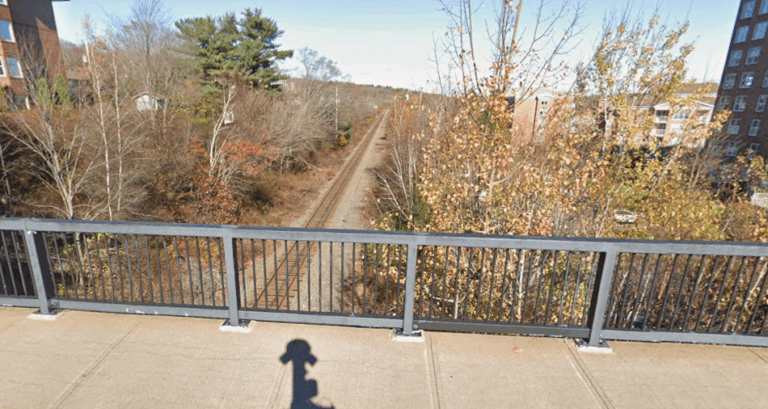 The rail line that crosses through Bedford along the highway can be seen. (Google Maps)