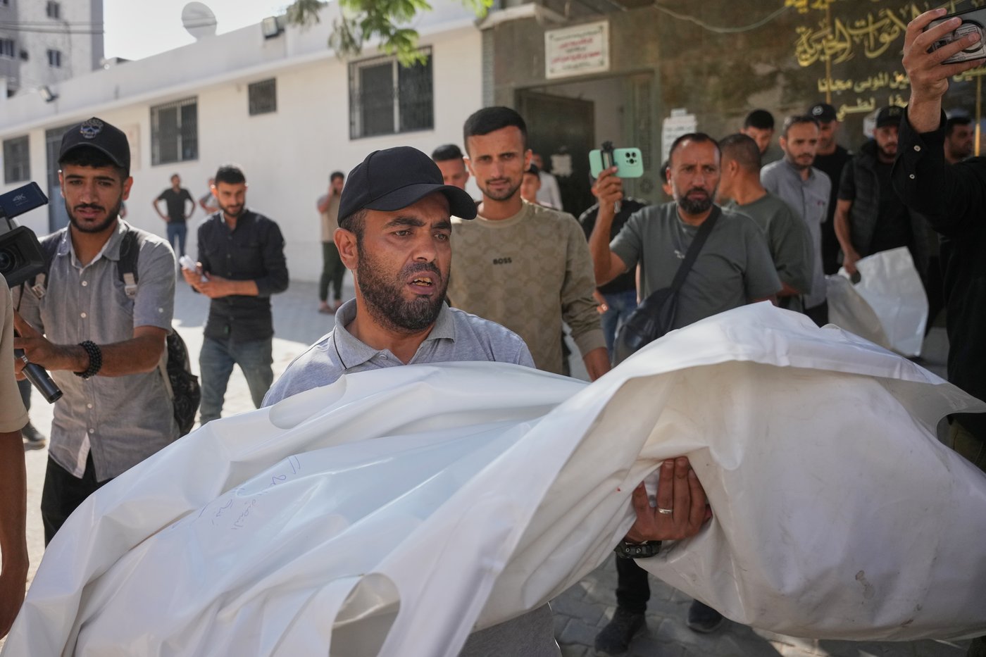An Israeli strike hits a Gaza City apartment, killing 2 children, Palestinian health officials say