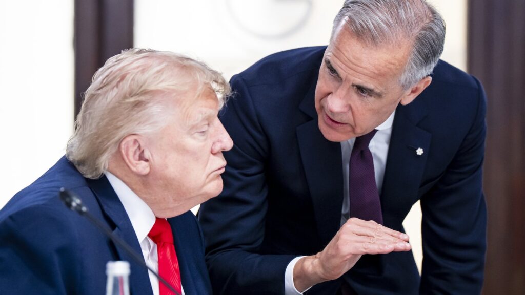 Prime Minister Mark Carney and U.S. President Donald Trump speak at the G7 working luncheon in Evian-les-Bains, France on Tuesday, June 16, 2026. THE CANADIAN PRESS/Christopher Katsarov